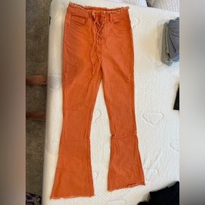 Orange tie up denim pants